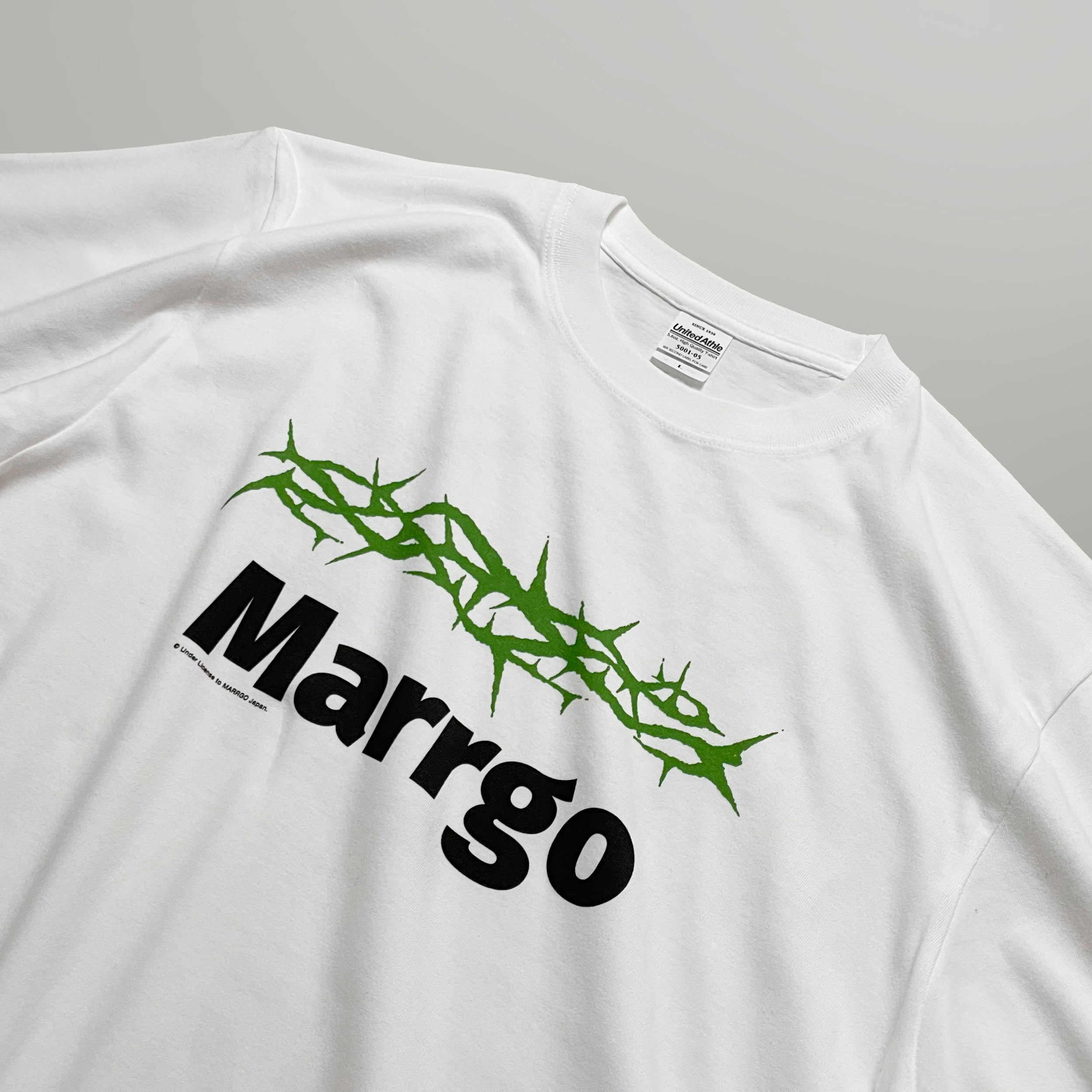 Ibara Tシャツ ホワイト フロント グラフィック 斜め